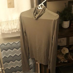 Chic, long sleeved, olive colored turtle. Perfect for layering! H&M size M.